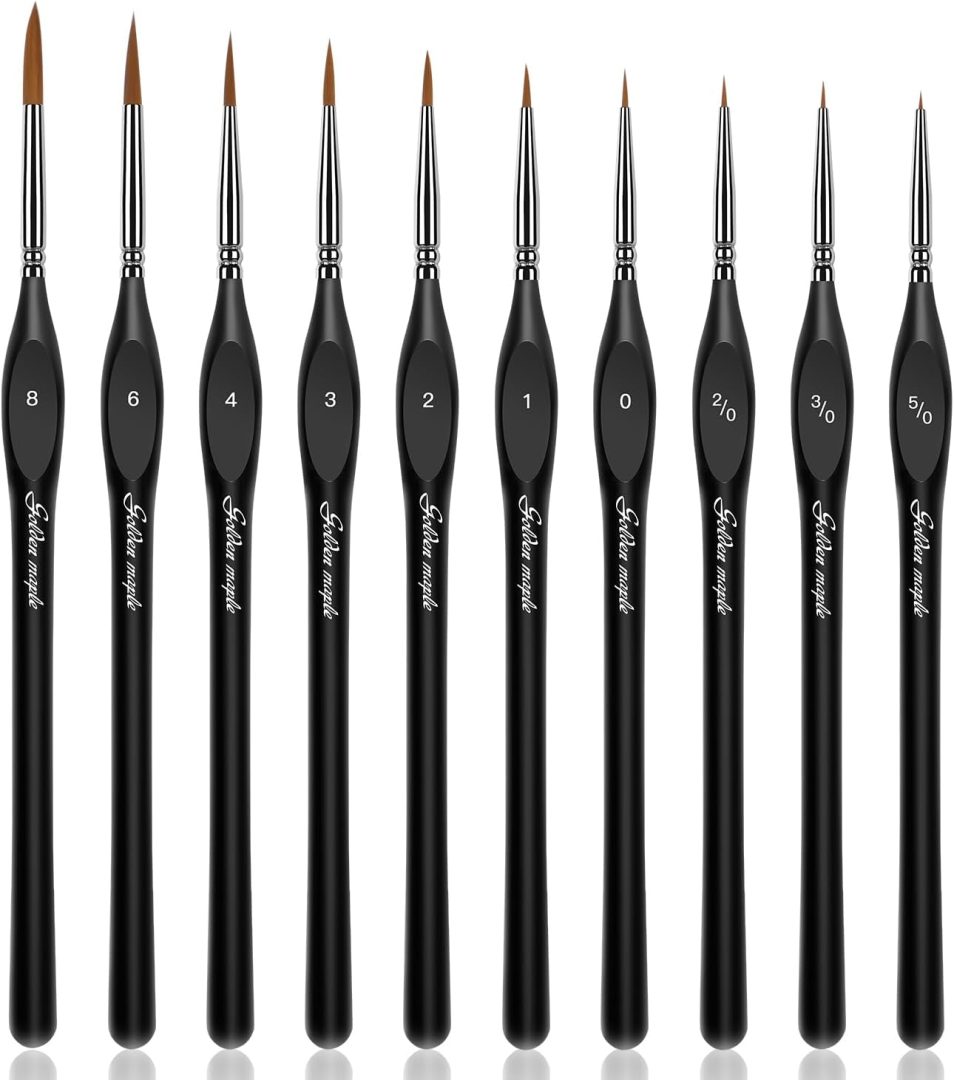 A Hand-Carved Mahogany Paint Brush Set with Gold Ferrules